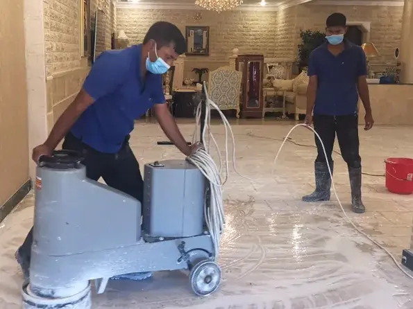 Two Professional Cleaning cleaning apartment floor in Kuwait